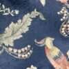 "Plush cushion fabric with intricate patterns for a sophisticated touch to your living space."