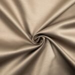 "Luxury curtain and cushion fabric in rich textures, adding warmth and style to your home."