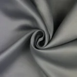 "Luxury curtain and cushion fabric in rich textures, adding warmth and style to your home."