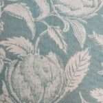 "Stylish printed cushion fabric that complements both traditional and contemporary interior designs."