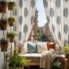 Elegant white curtain with blue floral tree print styled in a bright balcony living space