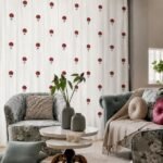 Elegant white curtain with red floral print styled in a modern luxury living room