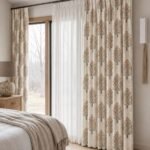 Elegant floral printed curtain in a soft beige and ivory tone, featuring detailed orange and grey botanical motifs in a modern bedroom setting.