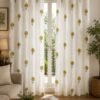 Elegant cream curtain with yellow and olive green floral print, styled on a large living room window.
